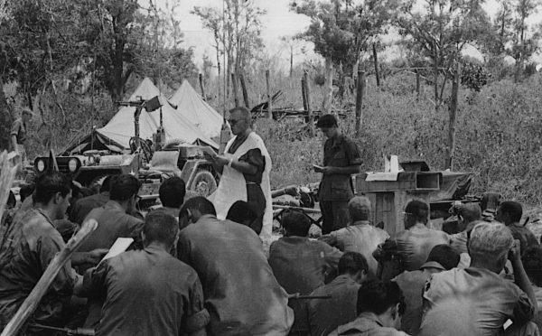 Black and white photo of seated soldierss