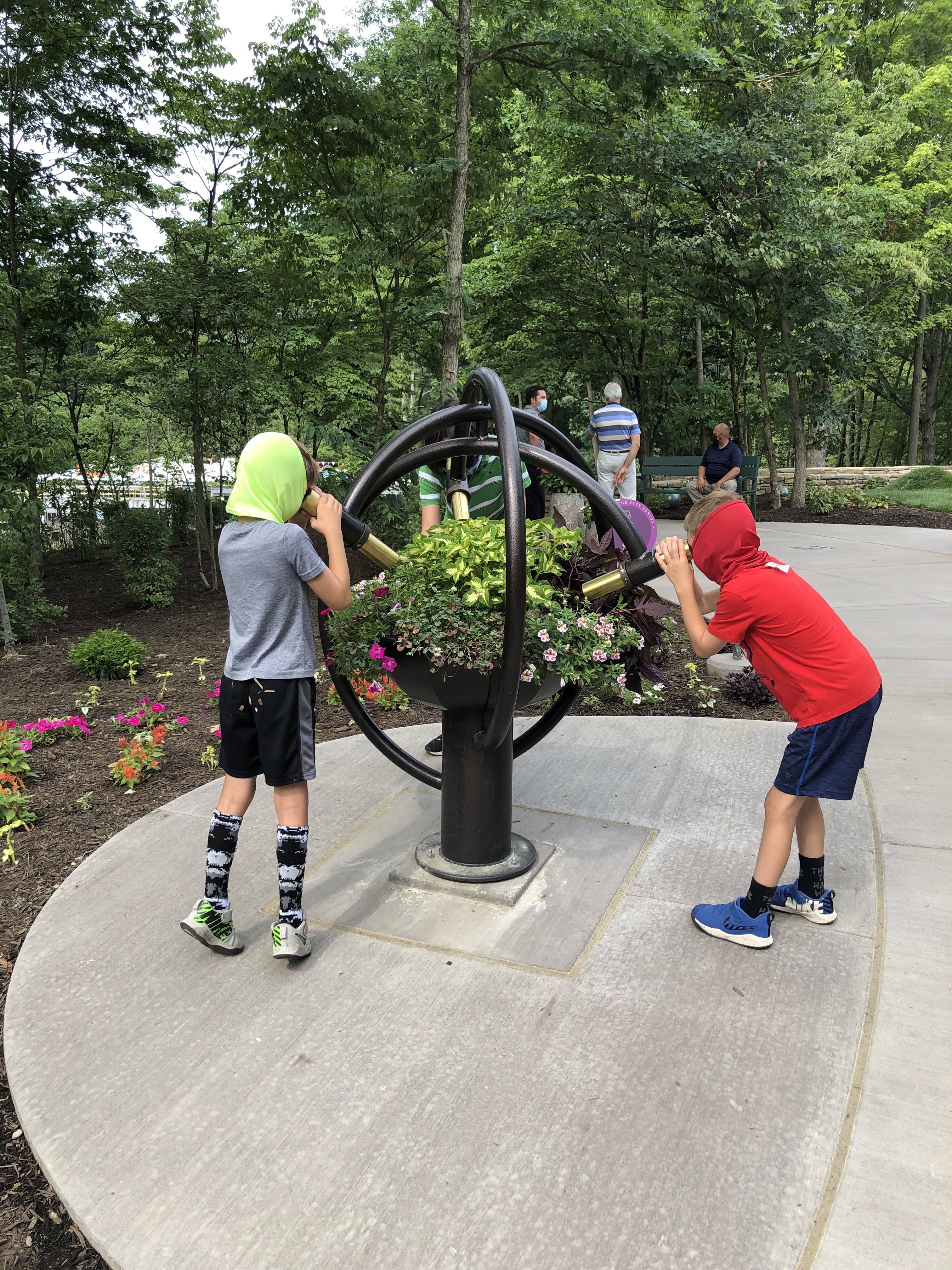 Children looking through a telescope.