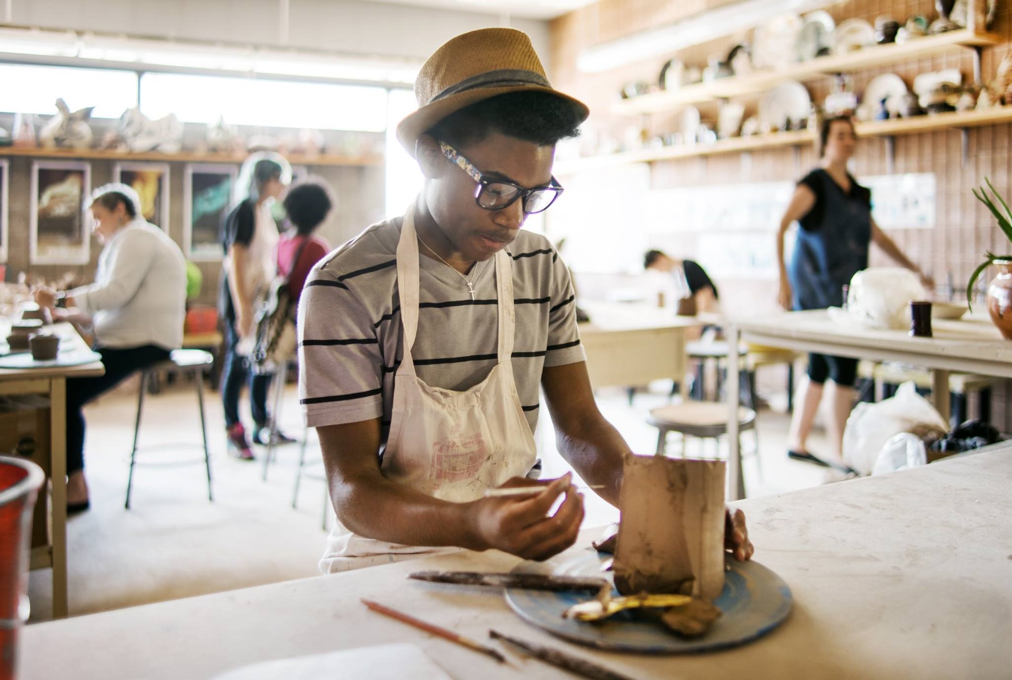 Students working on art projects at Manchester Craftsmen's Guild