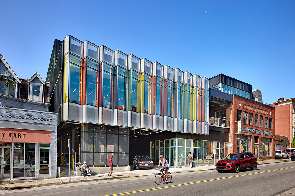 Exterior view of Pittsburgh Glass Center, a multi-level building with colored glass windows